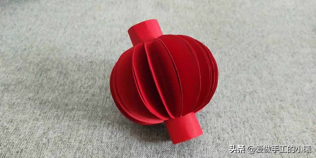 快过年了，用彩纸做个红红火火的灯笼吧，灯笼折纸图解