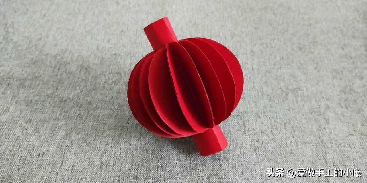 快过年了，用彩纸做个红红火火的灯笼吧，灯笼折纸图解